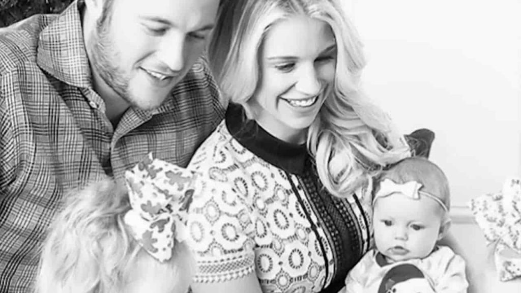 KELLY STAFFORD WITH THEIR HUSBAND AND CHILD